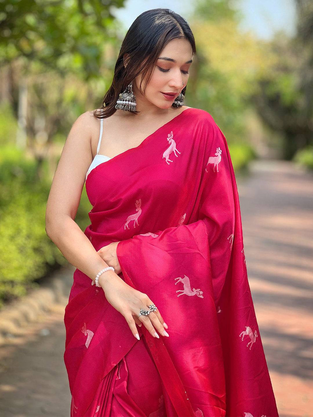 Pink Printed Silk Saree with Deer Motifs & Artistic Forest Themed Pallu