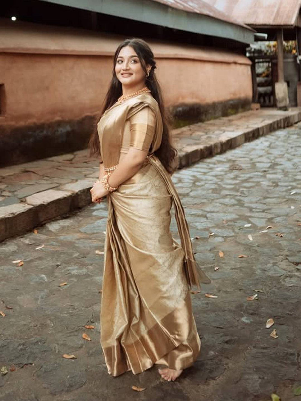 Golden Kanjivaram Silk Saree with Self Weaving Floral Design