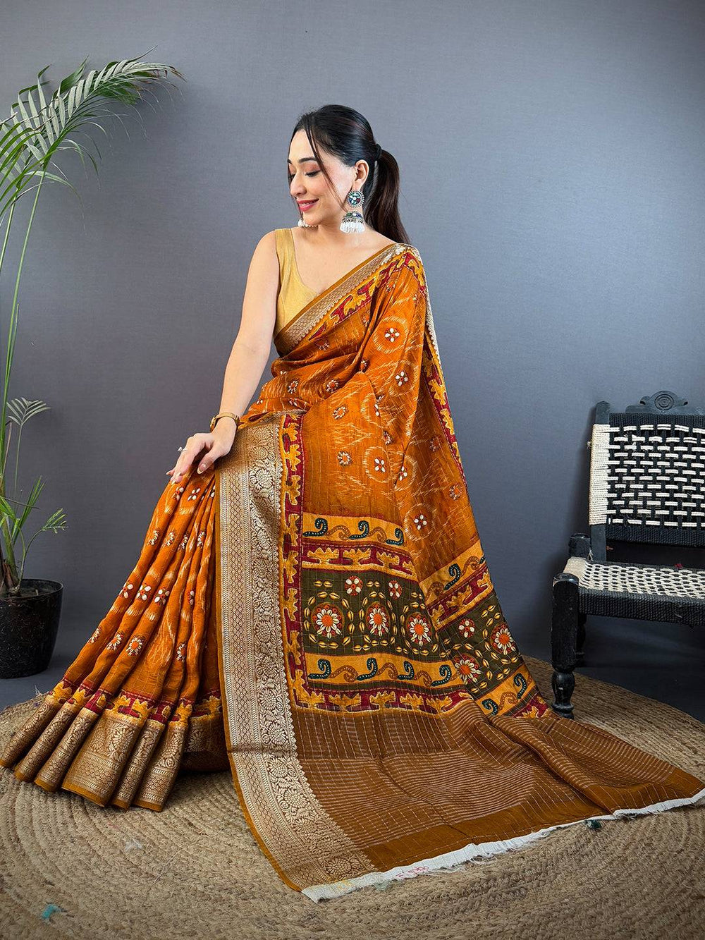 Rust Orange Soft Silk Saree with Gold Zari Border & Patola Inspired Weaving