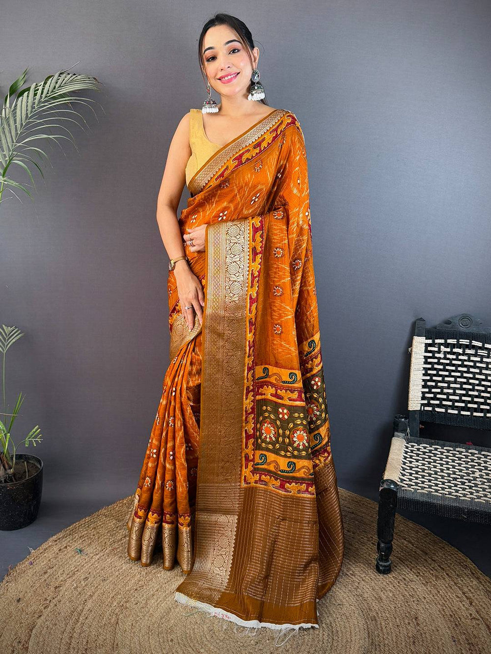 Rust Orange Soft Silk Saree with Gold Zari Border & Patola Inspired Weaving