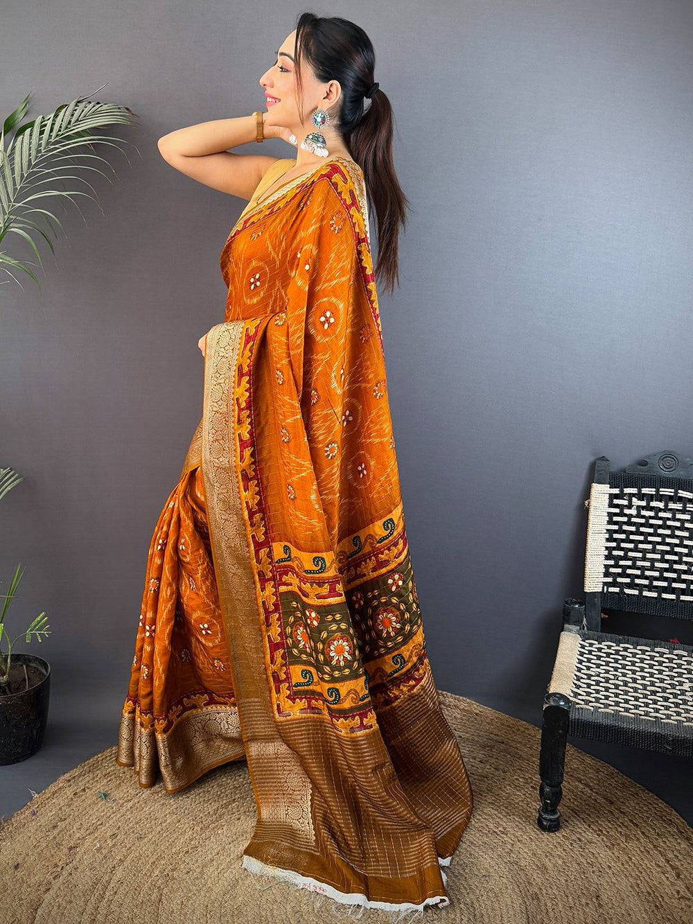Rust Orange Soft Silk Saree with Gold Zari Border & Patola Inspired Weaving