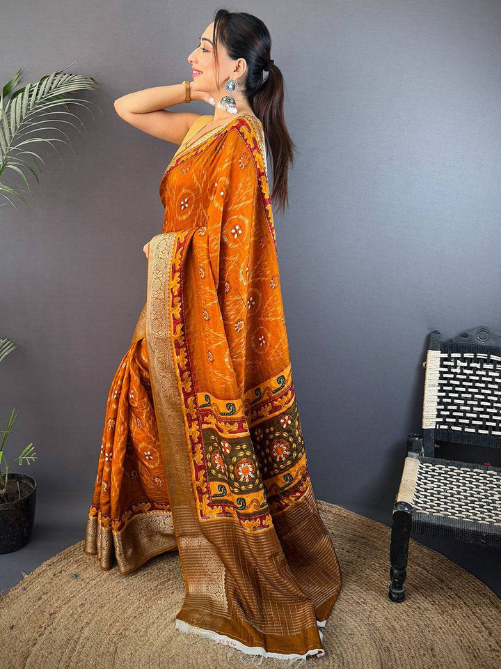 Rust Orange Soft Silk Saree with Gold Zari Border & Patola Inspired Weaving