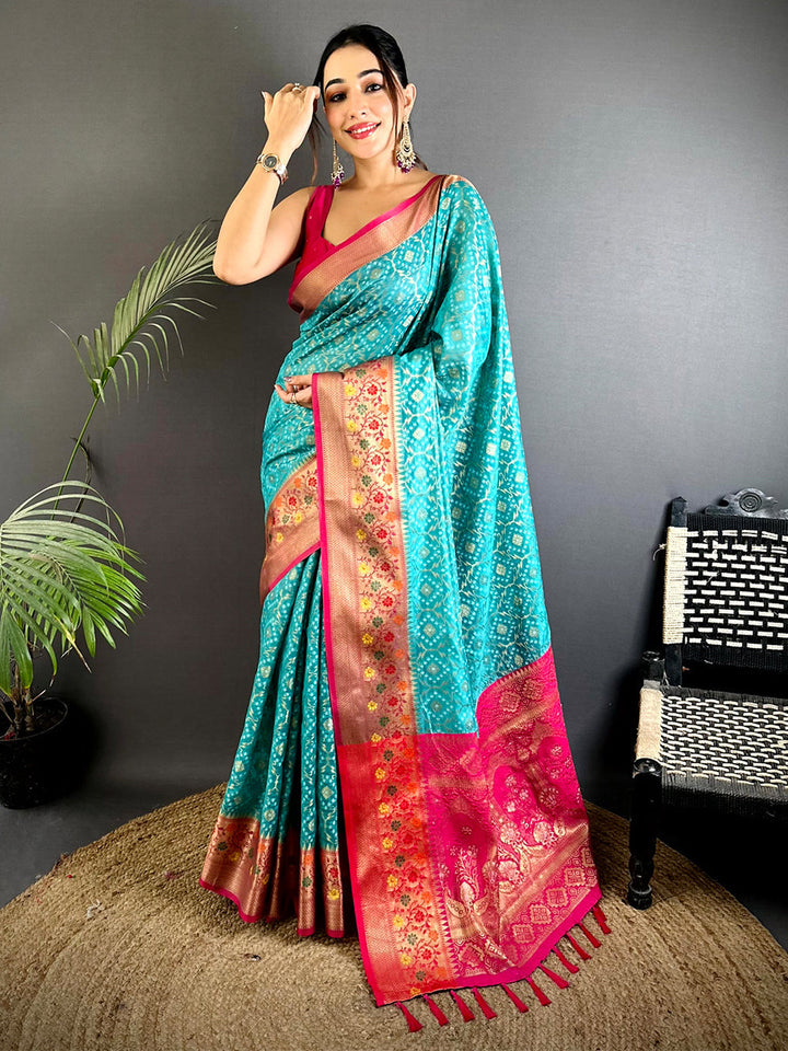 Teal Blue Banarasi Silk Saree with Pink Zari Border