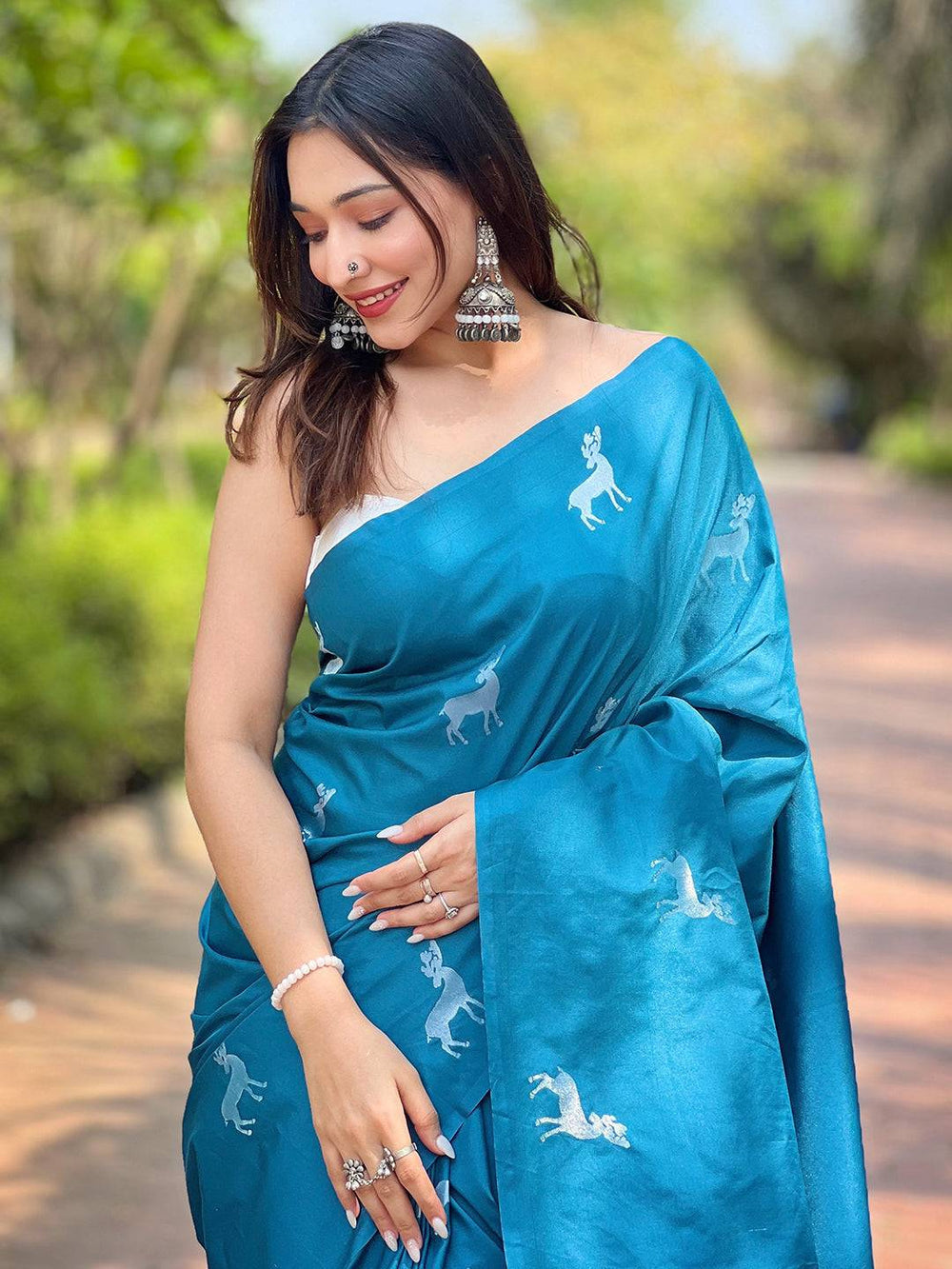 Teal Blue Printed Silk Saree for Women with Deer Motifs & Artistic Pallu