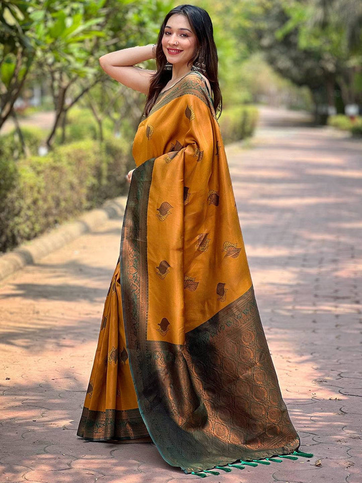 Mustard Yellow Banarasi Silk Saree with Green Zari Border & Leaf Motifs