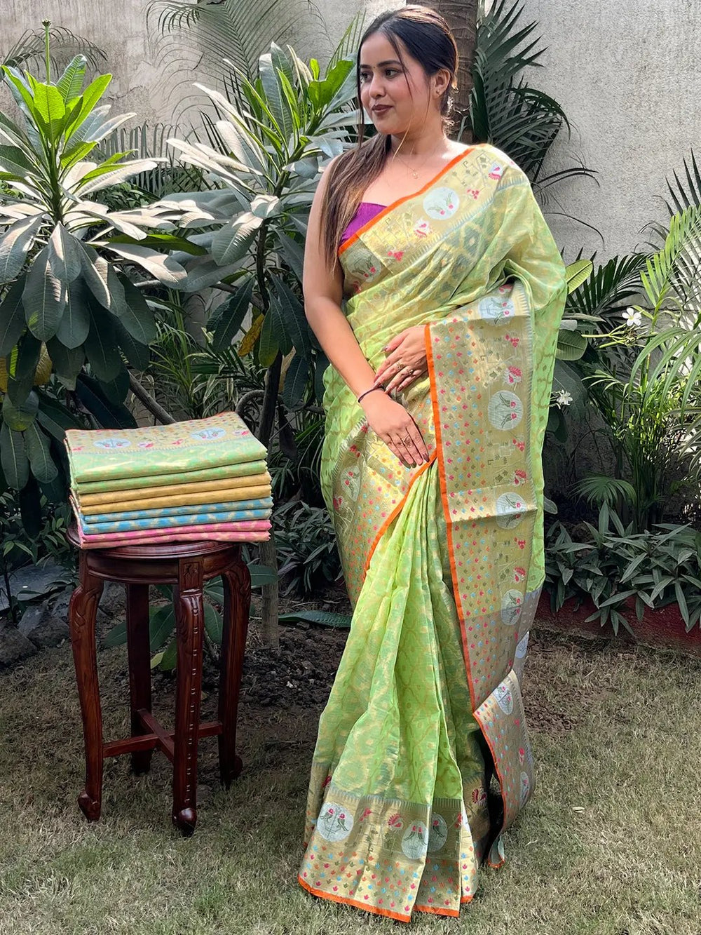 Light Green Soft Silk Saree with Weaving Motifs & Contrast Orange Border