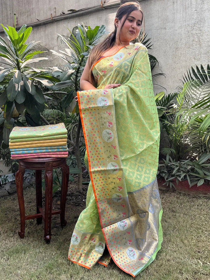 Light Green Soft Silk Saree with Weaving Motifs & Contrast Orange Border