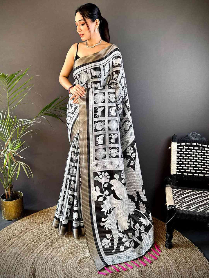 Black & White Printed Silk Saree with Artistic Motifs and Tassel Pallu
