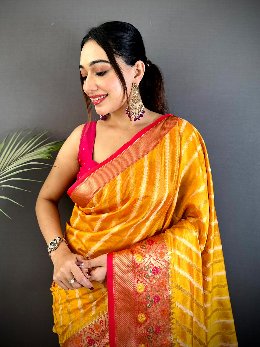 Yellow Banarasi Silk Saree with Pink Zari Border & Diagonal Stripes