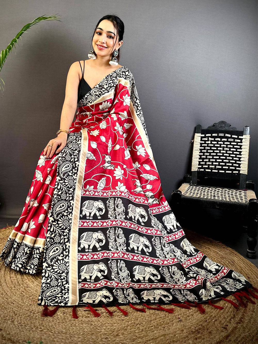 Red & Black Printed Silk Saree with Elephant Motif Border & Tassel Pallu