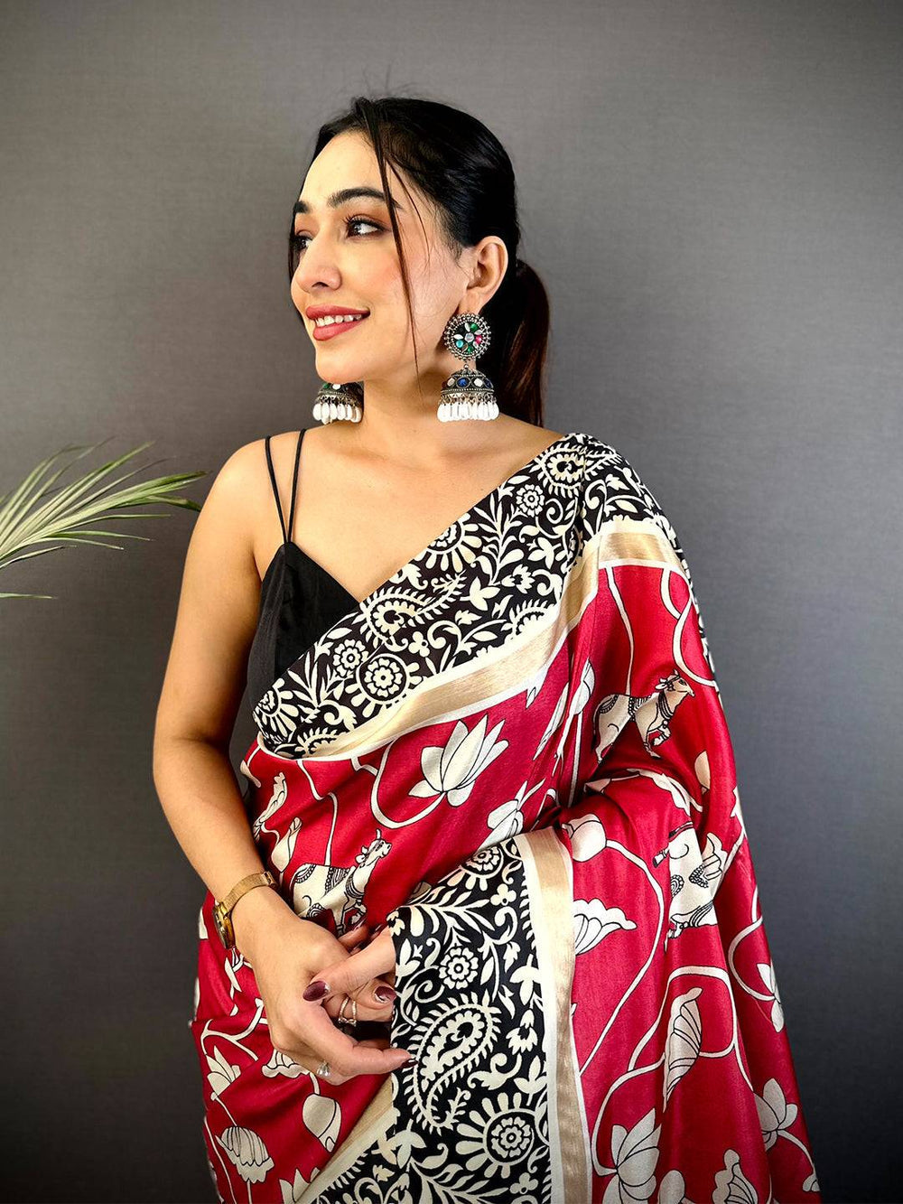 Red & Black Printed Silk Saree with Elephant Motif Border & Tassel Pallu